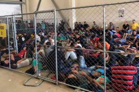 An overcrowded, fenced area holds families at a Border Patrol station in McAllen, Texas, on 10 June 2019. Reuters/Flickr.