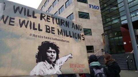 Berta Caceres demonstration at building of bank funder of dam