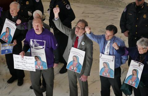 Gerry Lee, center with red tie