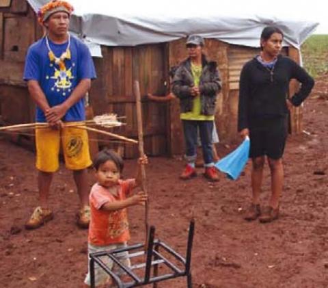 An indigenous family displaced from their land by the expansion of agribusiness in Mato Grosso do Sul, Brazil