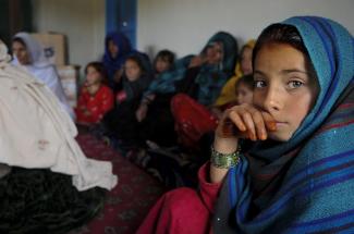 Photo of Afghan girls by DVIDSHUB, available on Flickr. Creative Commons 2.0. 