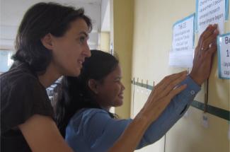 Maryknoll Lay Missioner Maria Montello with blind student 2018