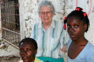 Maryknoll Sister Elizabeth Knoerl (center) and Haitian women