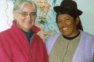 Maryknoll Sister Patricia Ryan and a member of an indigenous community in Peru